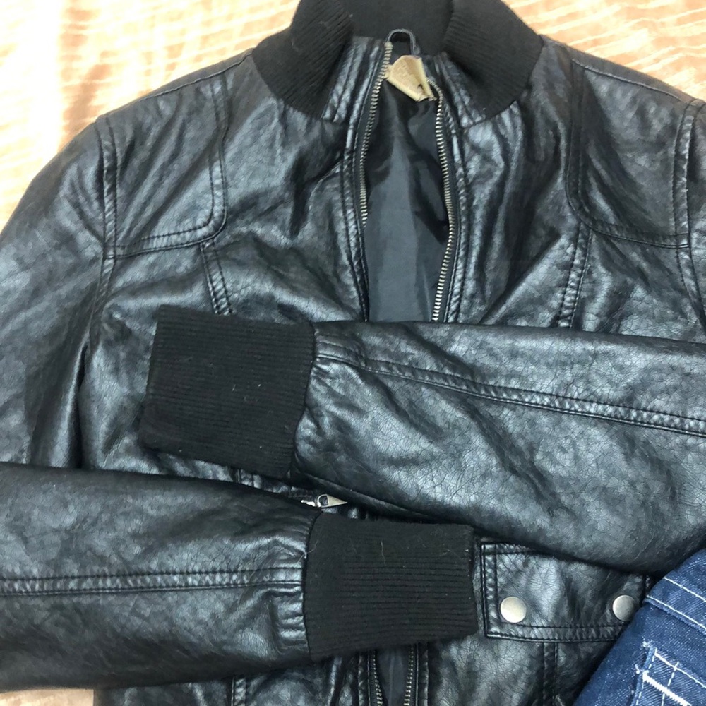 True Religion size 27/ jacket 100% polyester with 100% backing size small